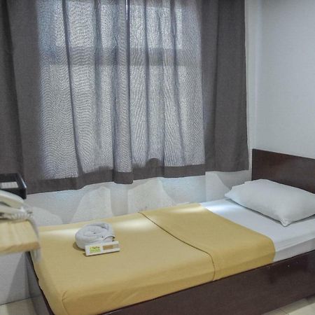 Tiptop Tower Suite Inn Dumaguete City Экстерьер фото
