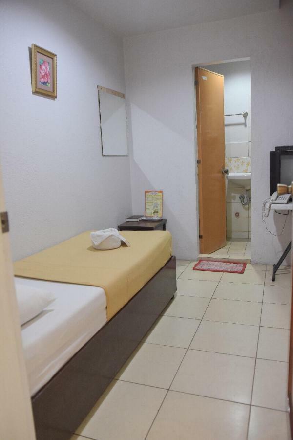 Tiptop Tower Suite Inn Dumaguete City Экстерьер фото