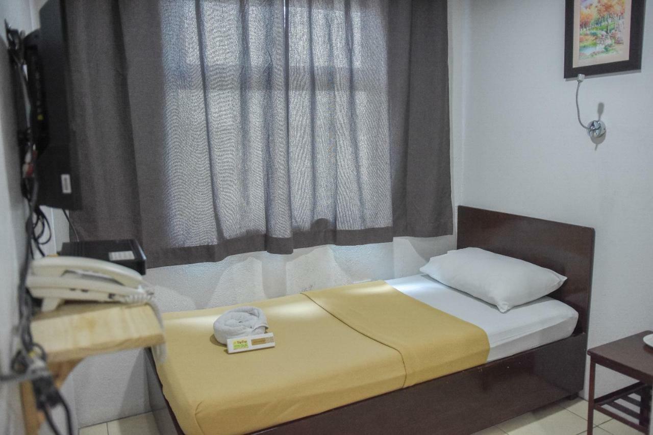 Tiptop Tower Suite Inn Dumaguete City Экстерьер фото