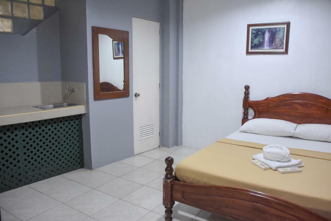 Tiptop Tower Suite Inn Dumaguete City Экстерьер фото
