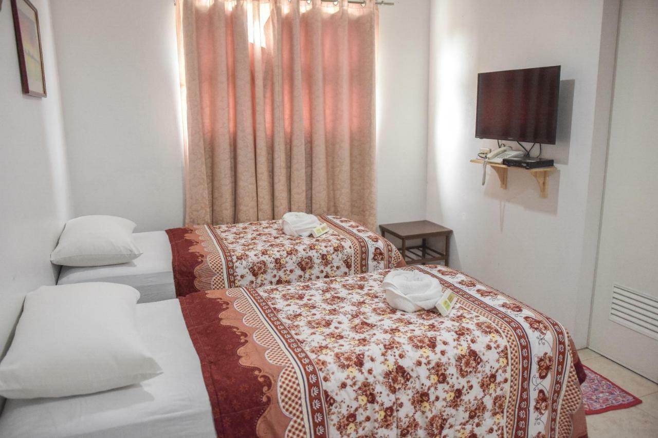 Tiptop Tower Suite Inn Dumaguete City Экстерьер фото