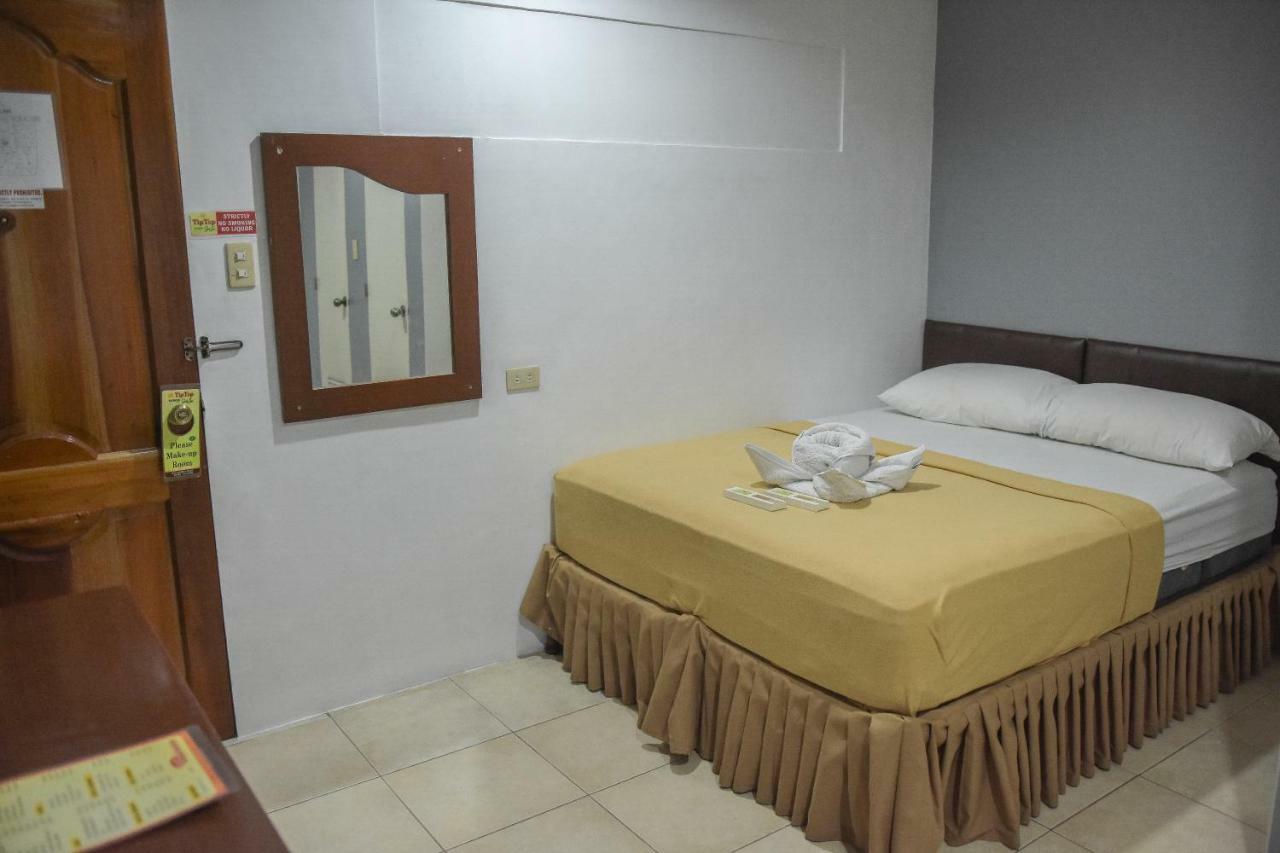Tiptop Tower Suite Inn Dumaguete City Экстерьер фото