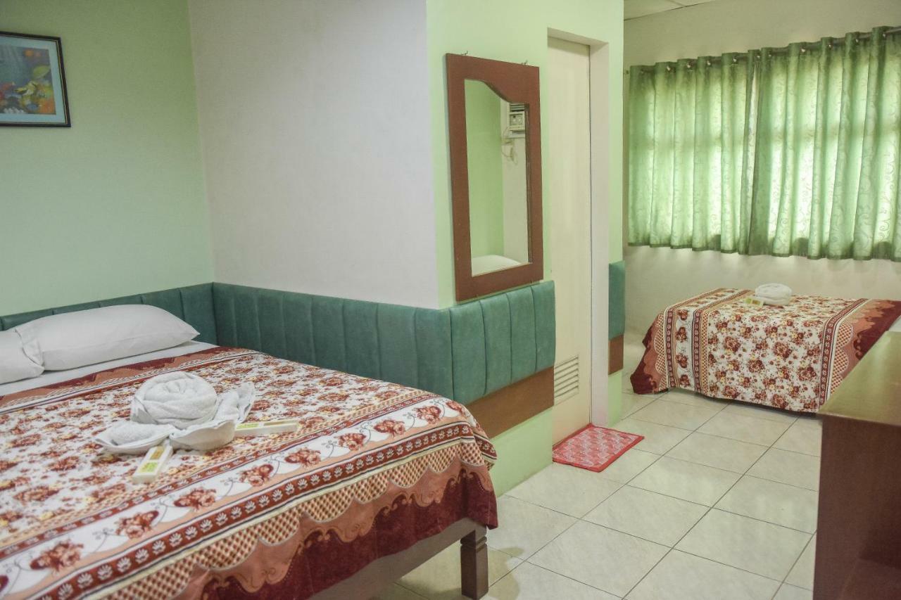 Tiptop Tower Suite Inn Dumaguete City Экстерьер фото