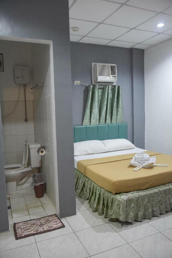 Tiptop Tower Suite Inn Dumaguete City Экстерьер фото